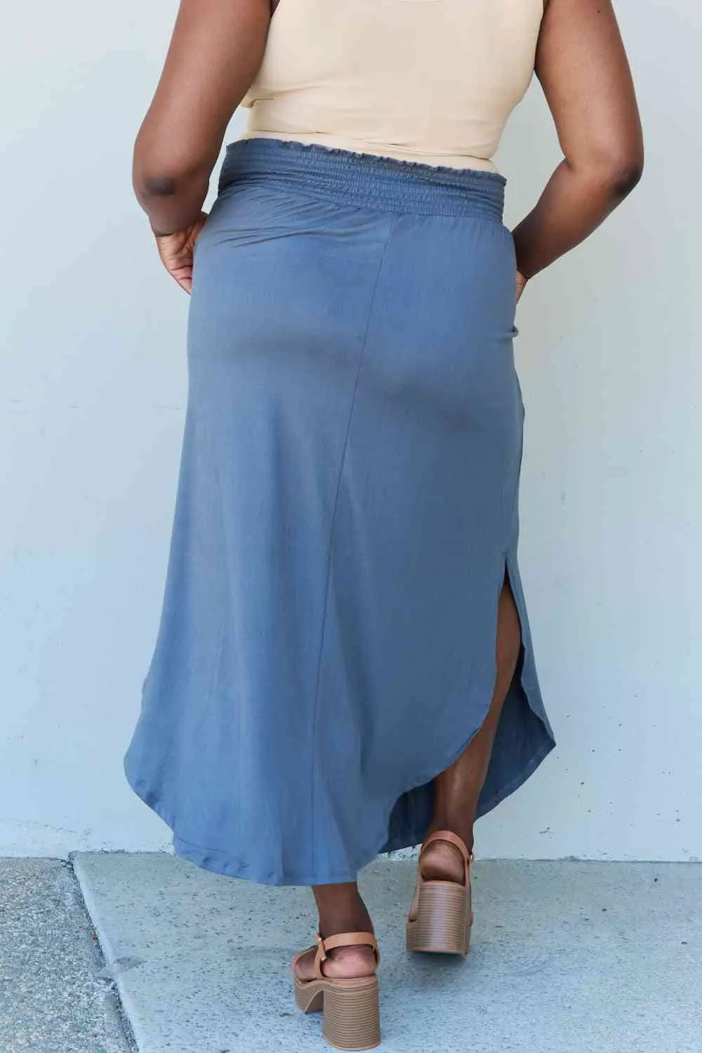 The Nina High Waist Scoop Hem Maxi Skirt in Dusty Blue