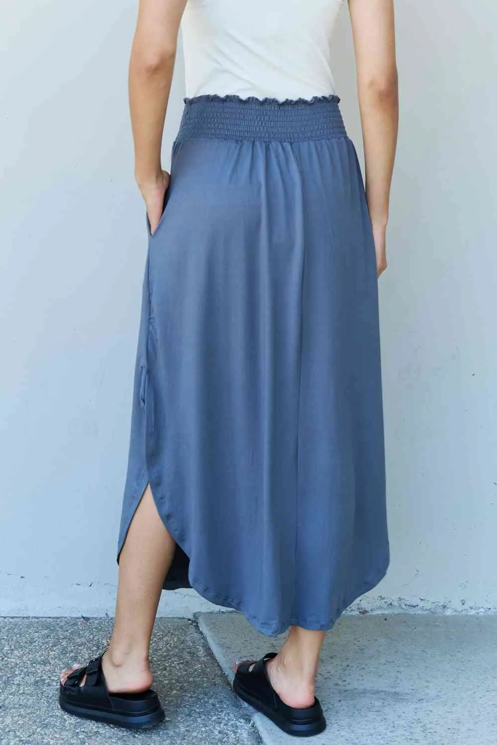 The Nina High Waist Scoop Hem Maxi Skirt in Dusty Blue